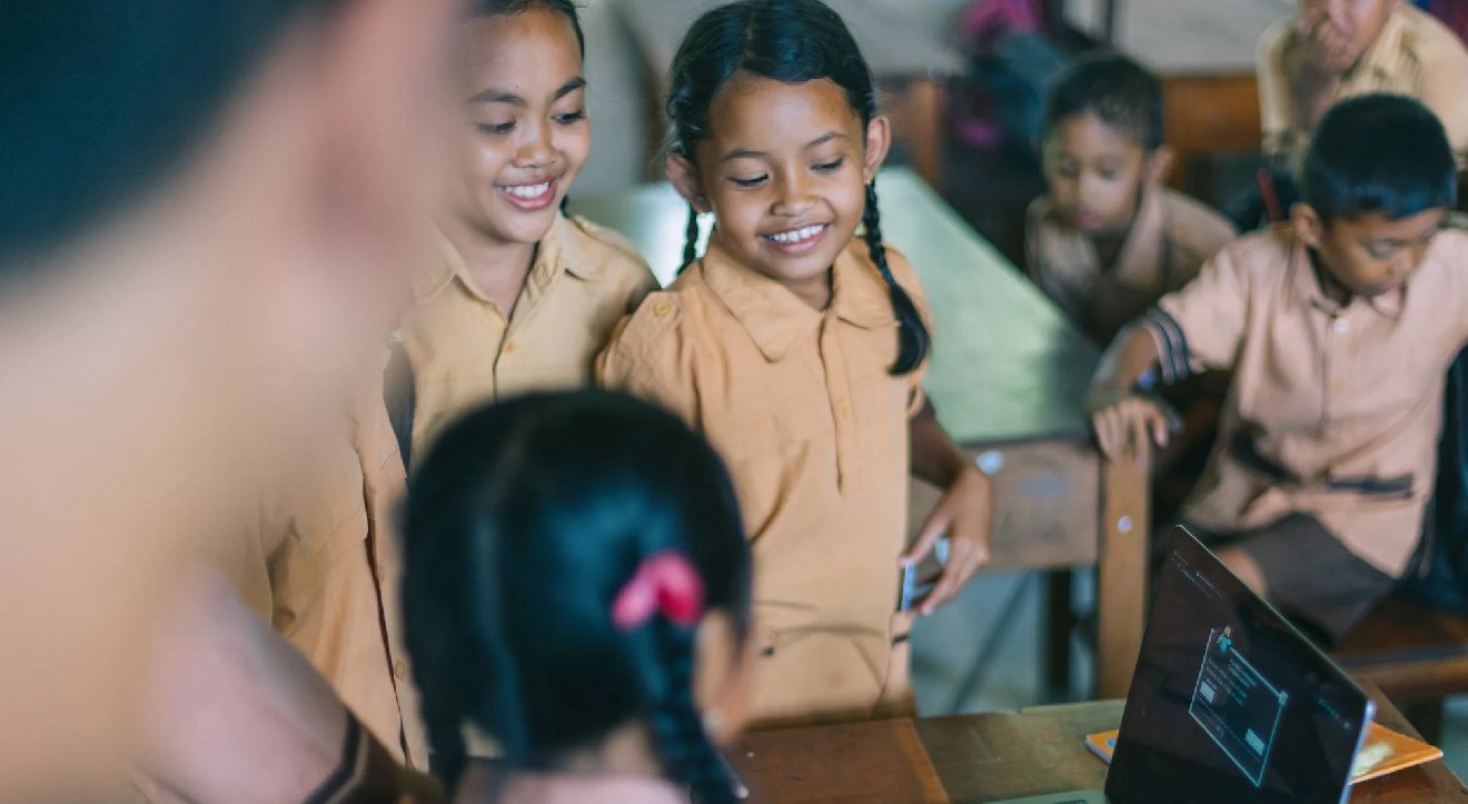 Children looking at a laptop